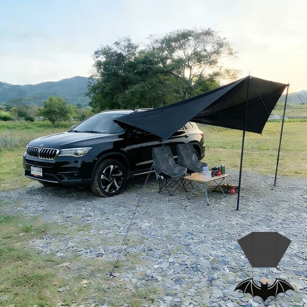Bat wing car awning in off white with black underside attached to the side of an SUV