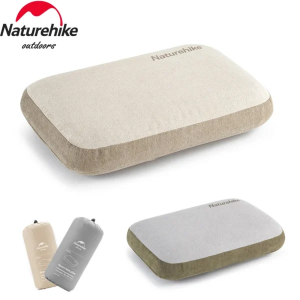 Grey memory foam square pillow sitting on a sleeping bag next to its compact storage roll