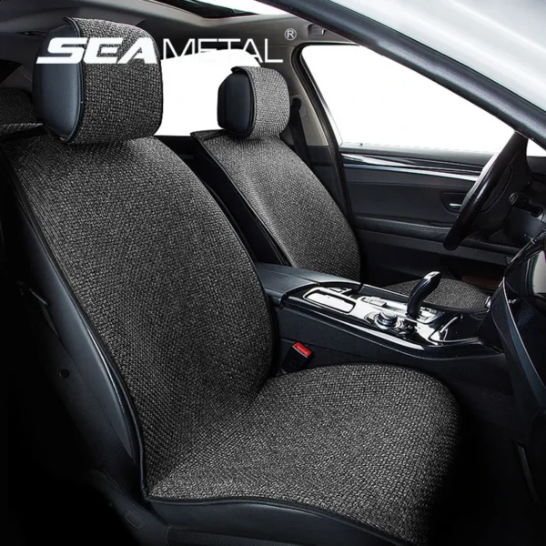 Linen car seat cushion in gray with a one-piece design fitted on a car front seat
