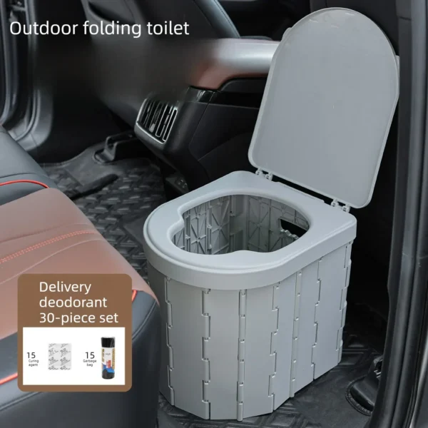 Car camping toilet in folding plastic design with lid, shown open and ready to use