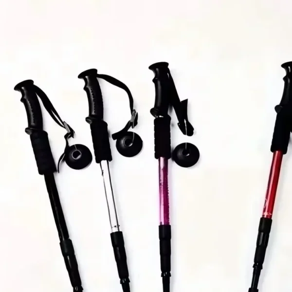 Four section trekking pole in silver aluminum with straight grip handle and steel tip