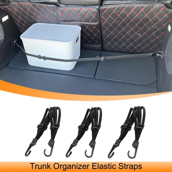 Elastic cargo strap with hooks securing a duffel bag and cooler in a car trunk