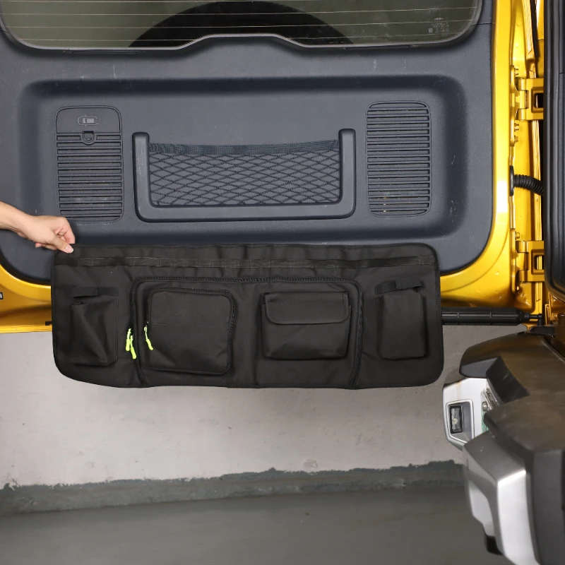 Tailgate Tool Storage Bag for BYD Leopard 5 and Denza B5 1 Black tailgate tool storage bag mounted inside the rear hatch of a BYD Leopard 5