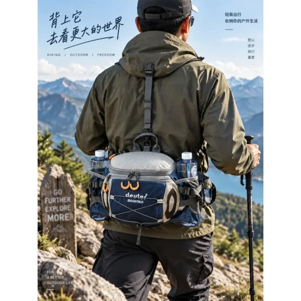 Black waterproof sports waist bag worn across the shoulder by a hiker on a mountain trail