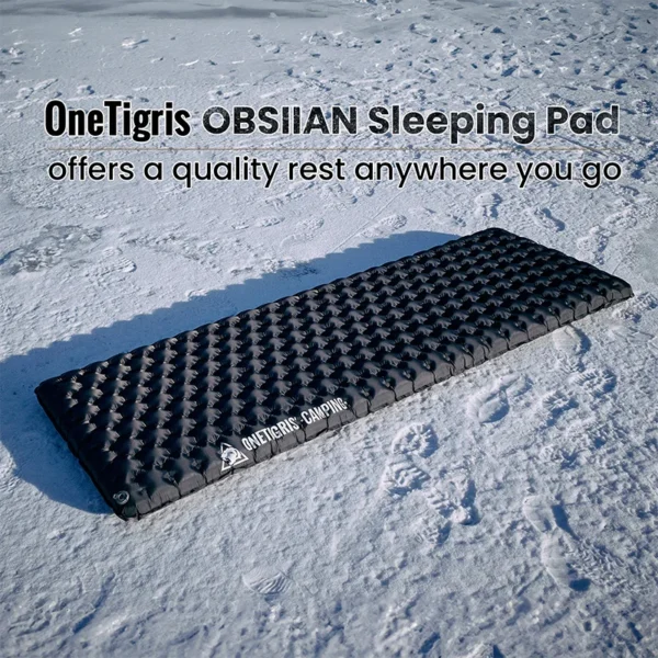 Insulated backpacking sleeping pad inflated in a tent with its air pumping device and patches