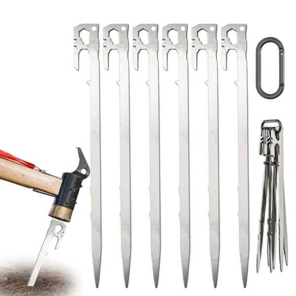 Stainless steel tent stakes 28cm long driven into rocky ground securing a tent guy line