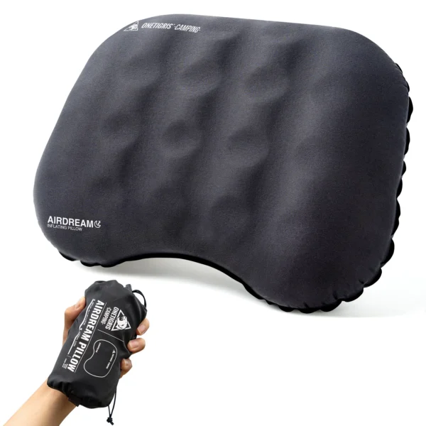 Ultralight travel neck pillow with a curved inflatable shape next to its small soda can sized pack