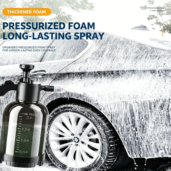 Pressurized foam sprayer covering a car door in thick wash foam on a driveway