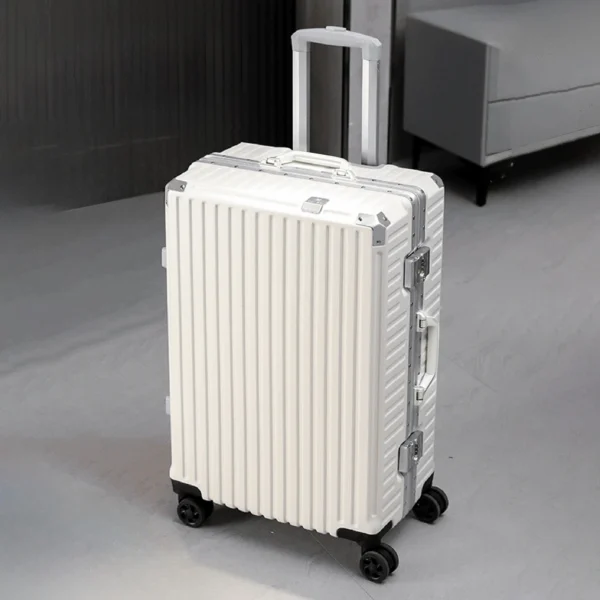 Silver aluminum frame hardside luggage with spinner wheels and extended pull handle