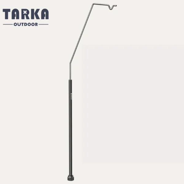 Table lantern hanger fitted to an IGT camping table with a lantern hanging above the cooking area