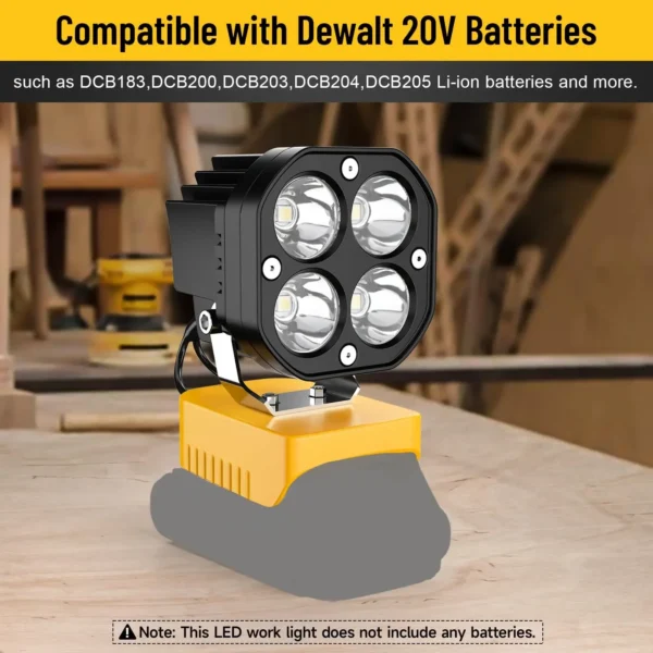 Cordless LED work light mounted on a 20V tool battery lighting up a campsite at night