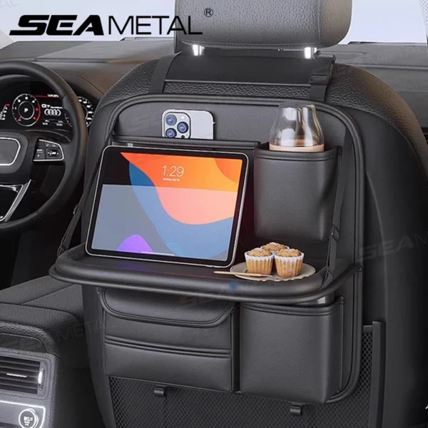 Backseat organizer with table folded down, showing pockets on the back of a car seat